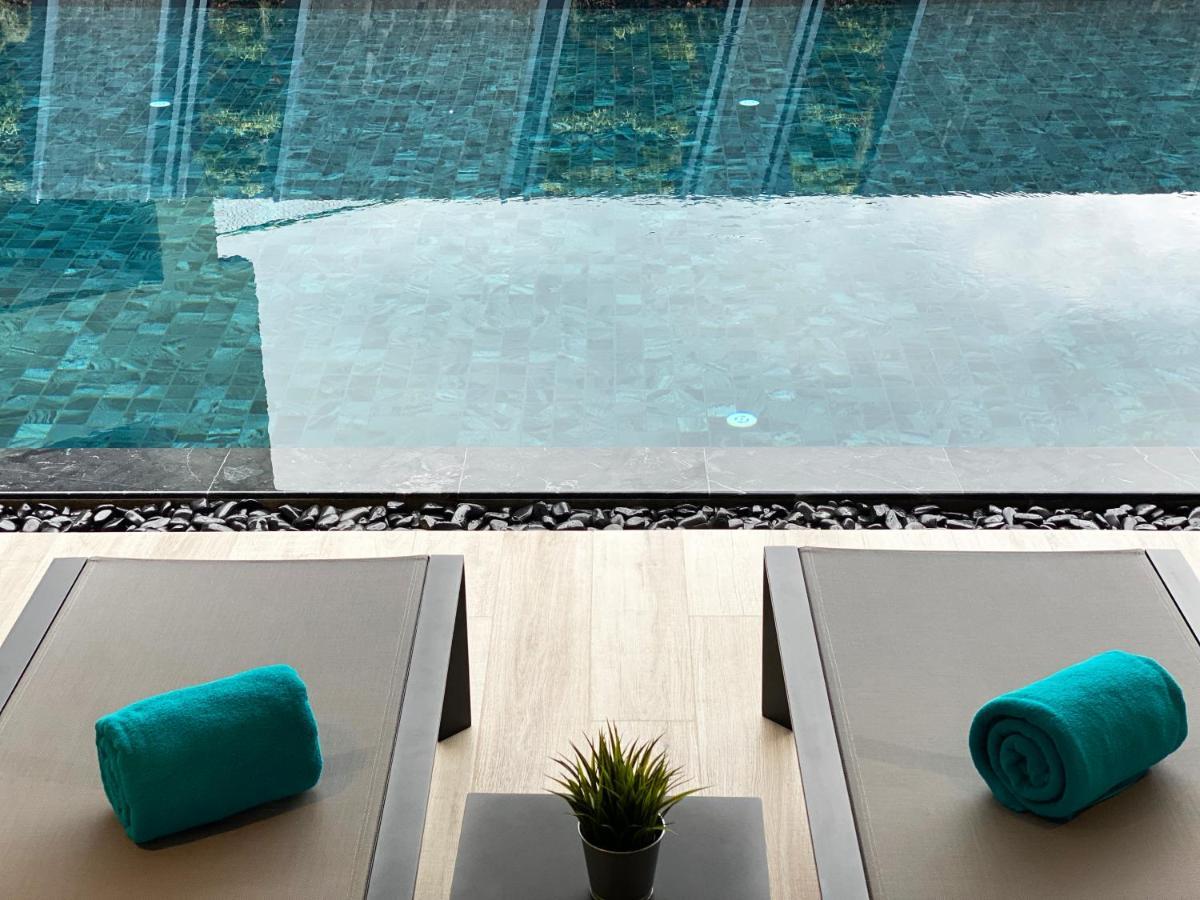 The Oceanic Sportel Phuket - Sha Extra Plus Exterior foto The swimming pool at the hotel