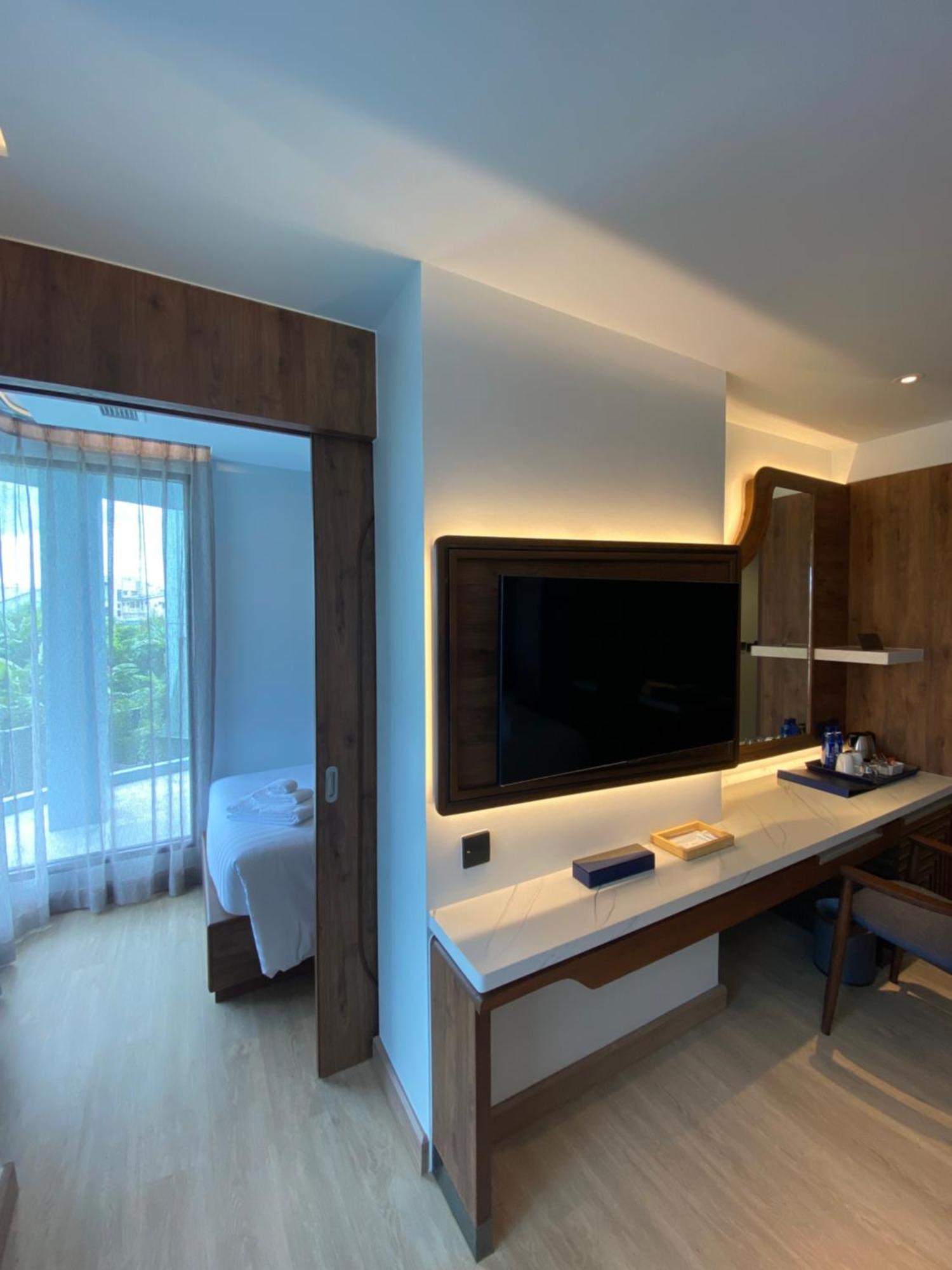 The Oceanic Sportel Phuket - Sha Extra Plus Exterior foto A room at the hotel